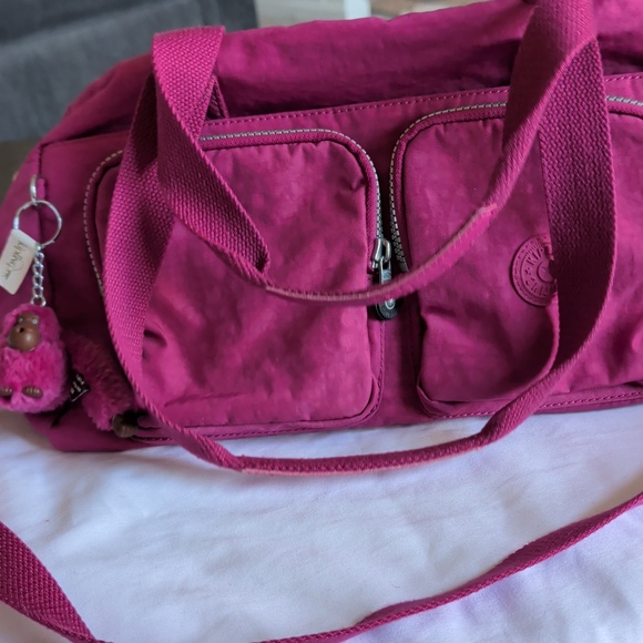 Kipling Handbags - Kipling pink cyrene purse